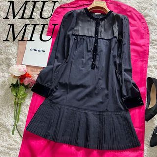 ミュウミュウ(miumiu)の【良品】MIU  MIU シャツワンピース ブラック 膝丈 プリーツ 長袖 38(ひざ丈ワンピース)