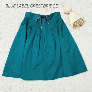 ブルーレーベルクレストブリッジ(BLUE LABEL CRESTBRIDGE)のブルーレーベルクレストブリッジ サテン リボン フレアスカート 緑 グリーン(ひざ丈スカート)