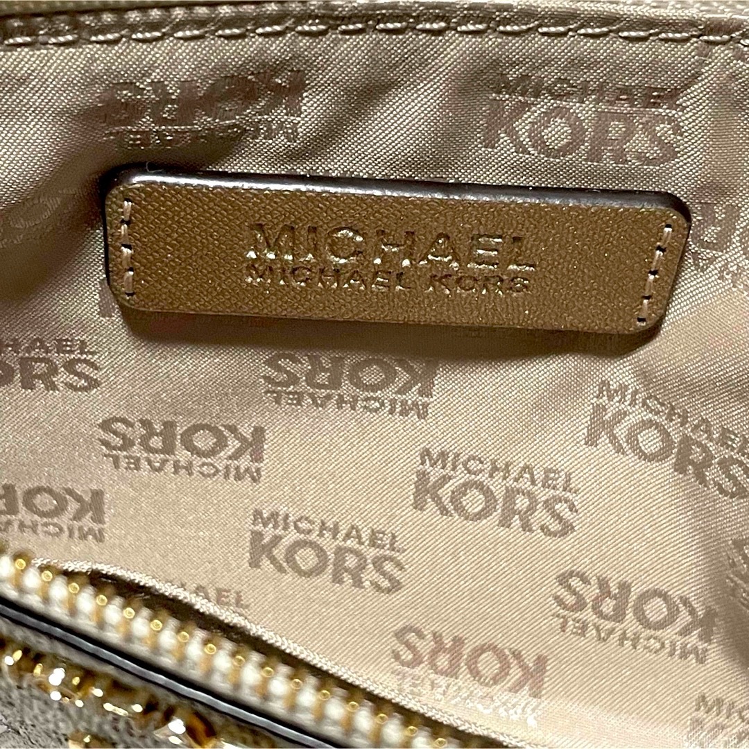 Michael Kors(マイケルコース)の匿名配送 未使用 マイケルコース　ポーチ　リストレット　ホワイト レディースのファッション小物(ポーチ)の商品写真