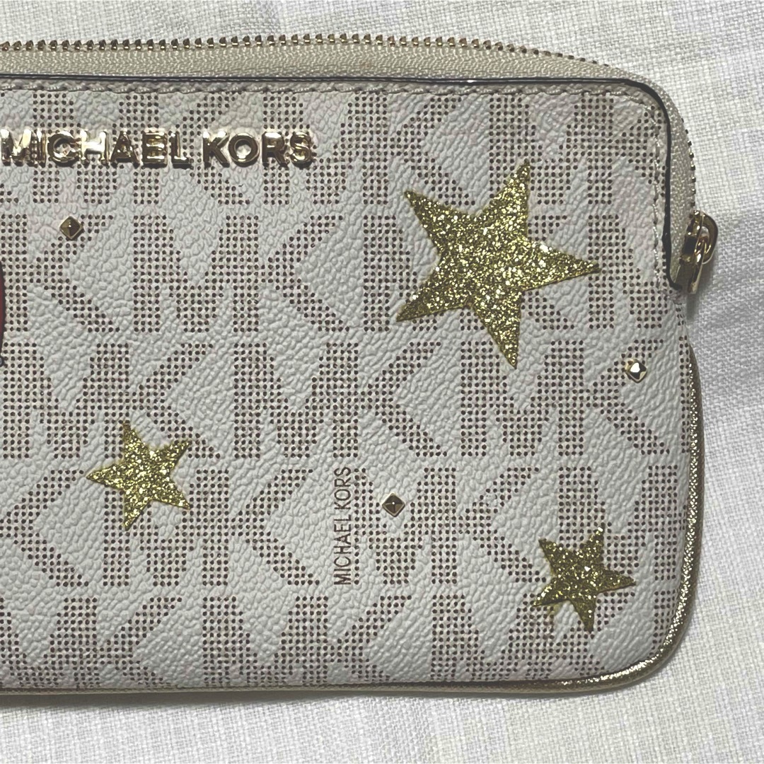 Michael Kors(マイケルコース)の匿名配送 未使用 マイケルコース　ポーチ　リストレット　ホワイト レディースのファッション小物(ポーチ)の商品写真