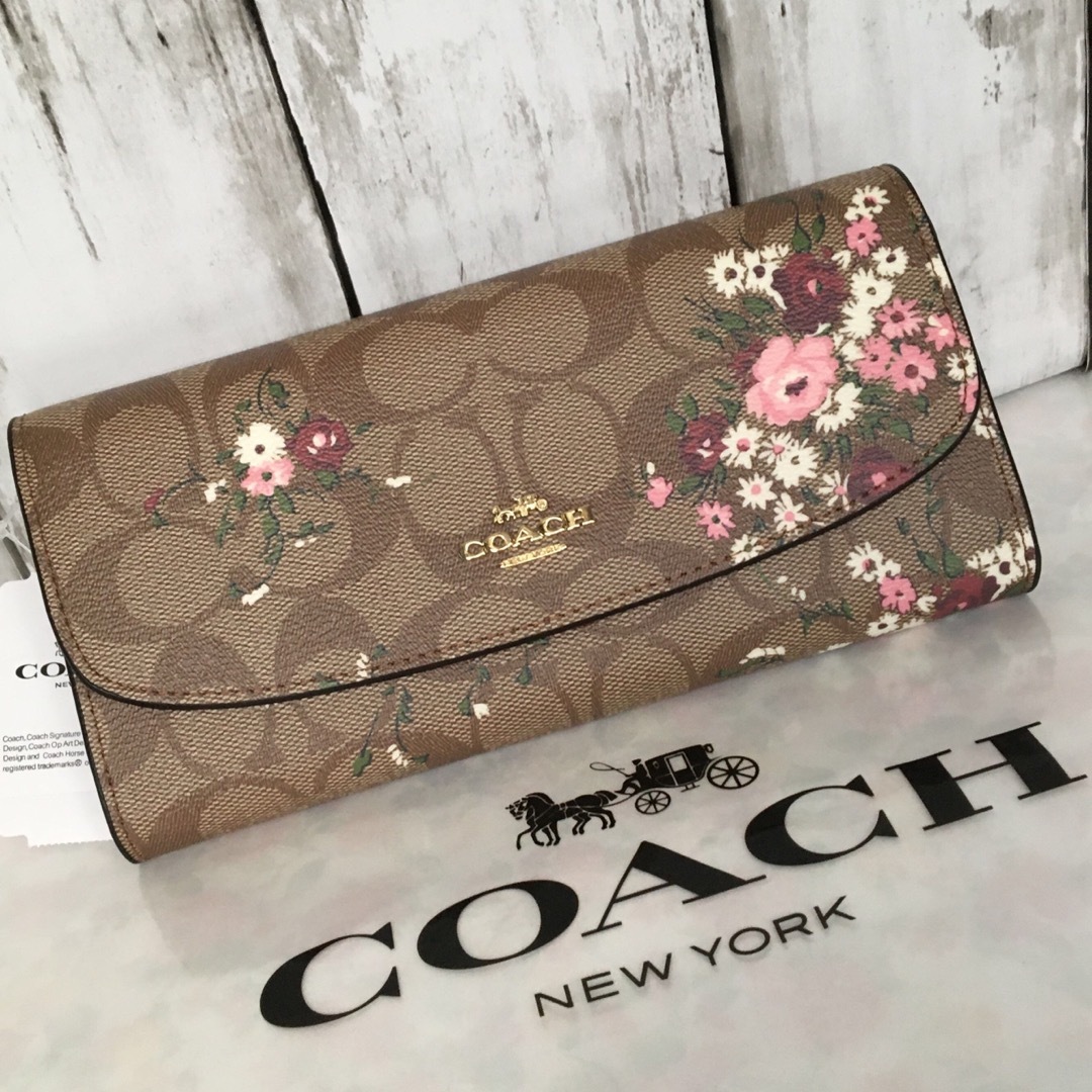 COACH(コーチ)の新品未使用　COACHコーチ長財布　レディース　シグネチャー　花柄 レディースのファッション小物(財布)の商品写真