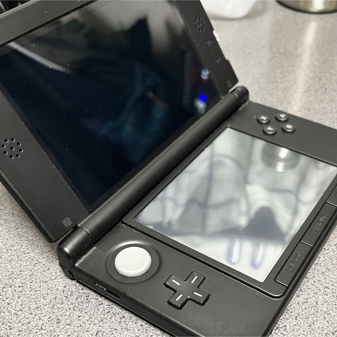 ニンテンドー3DS(ニンテンドー3DS)の【任天堂】Nintendo 3DS  LL 本体ブラック エンタメ/ホビーのゲームソフト/ゲーム機本体(携帯用ゲーム機本体)の商品写真