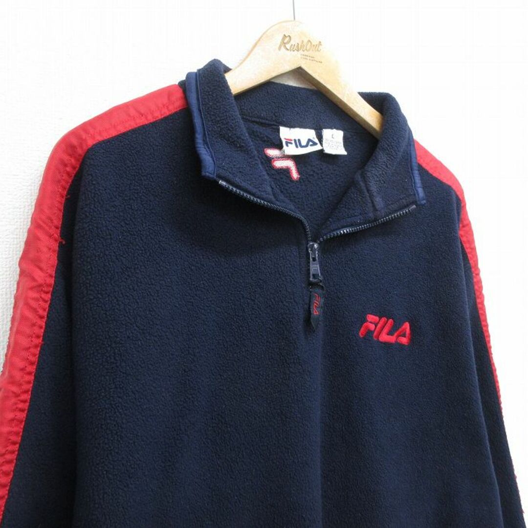 FILA(フィラ)のM★古着 フィラ FILA 長袖 ハーフジップ フリース トップス メンズ 90年代 90s ワンポイントロゴ カナダ製 紺 ネイビー 23dec13 中古 アウター メンズのジャケット/アウター(ダッフルコート)の商品写真