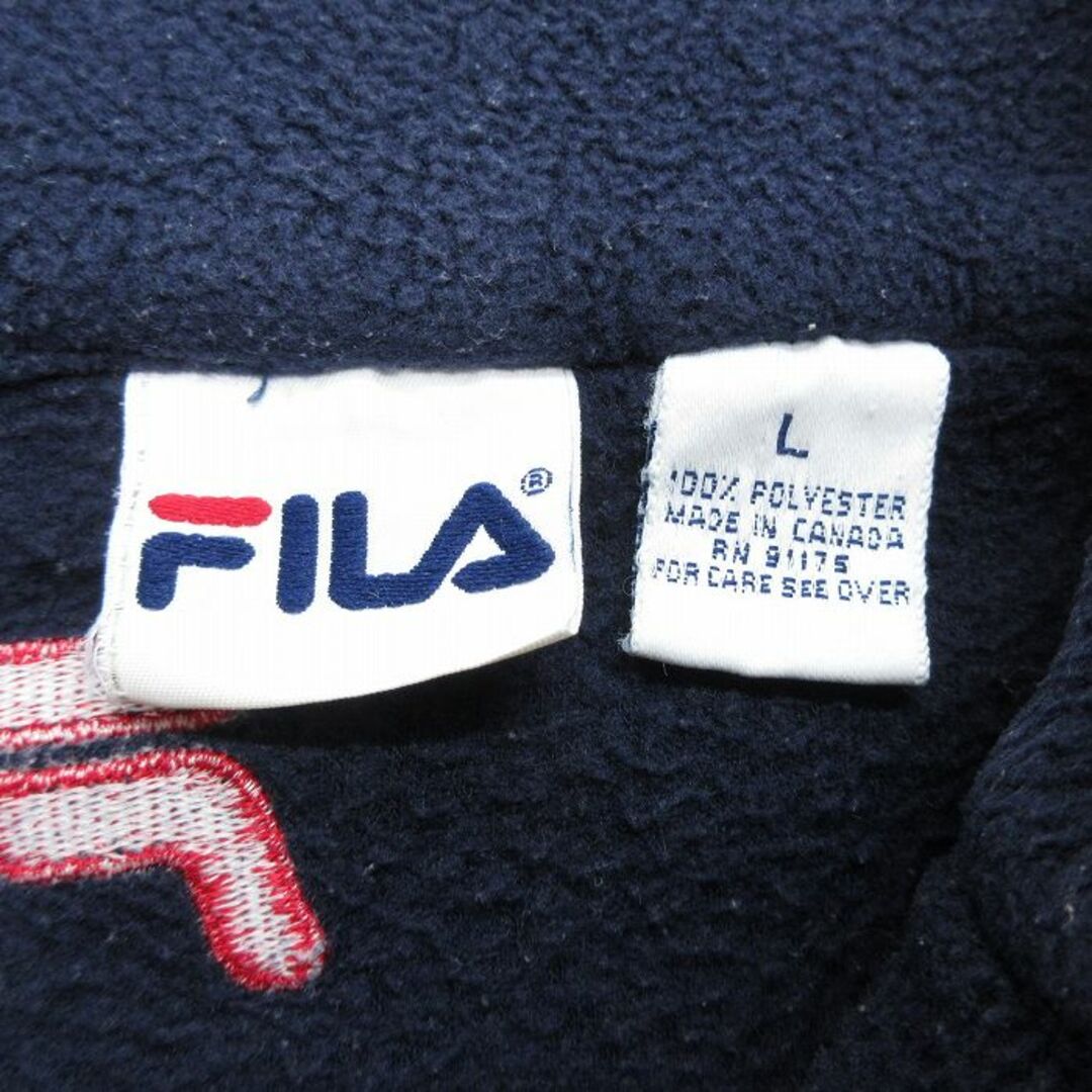 FILA(フィラ)のM★古着 フィラ FILA 長袖 ハーフジップ フリース トップス メンズ 90年代 90s ワンポイントロゴ カナダ製 紺 ネイビー 23dec13 中古 アウター メンズのジャケット/アウター(ダッフルコート)の商品写真