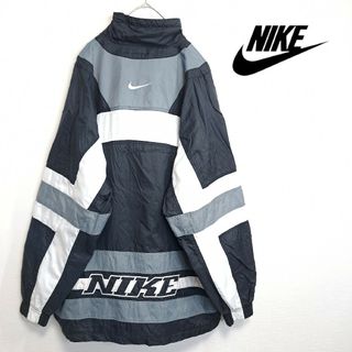 ナイキ(NIKE)の【美品】NIKE 銀タグ 90s ビッグロゴ ナイロンジャケット 黒×白 M(ナイロンジャケット)