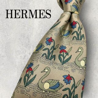 エルメス(Hermes)の美品 HERMES エルメス 白鳥 花柄 ネクタイ ベージュ グレー(ネクタイ)