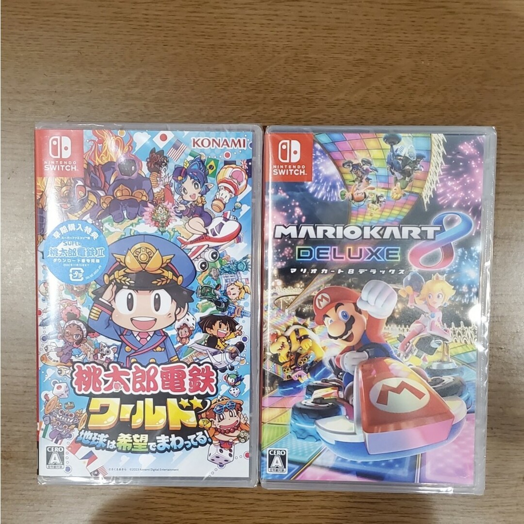 Nintendo Switch(ニンテンドースイッチ)の【新品・未開封】マリオカート8 デラックス & 桃太郎電鉄ワールド Switch エンタメ/ホビーのゲームソフト/ゲーム機本体(家庭用ゲームソフト)の商品写真