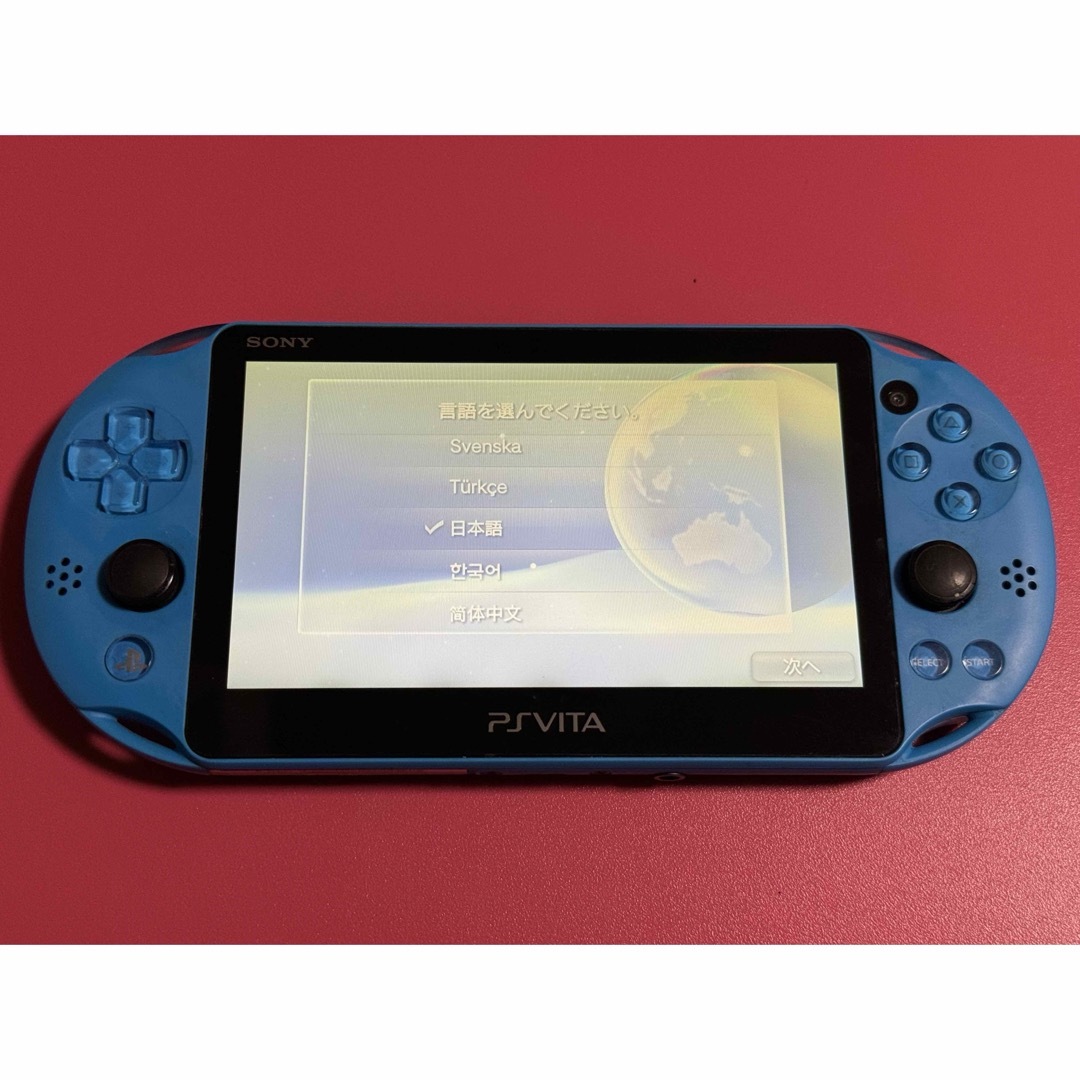 PlayStation Vita(プレイステーションヴィータ)のvita   アクアブルー　1番 エンタメ/ホビーのゲームソフト/ゲーム機本体(携帯用ゲーム機本体)の商品写真