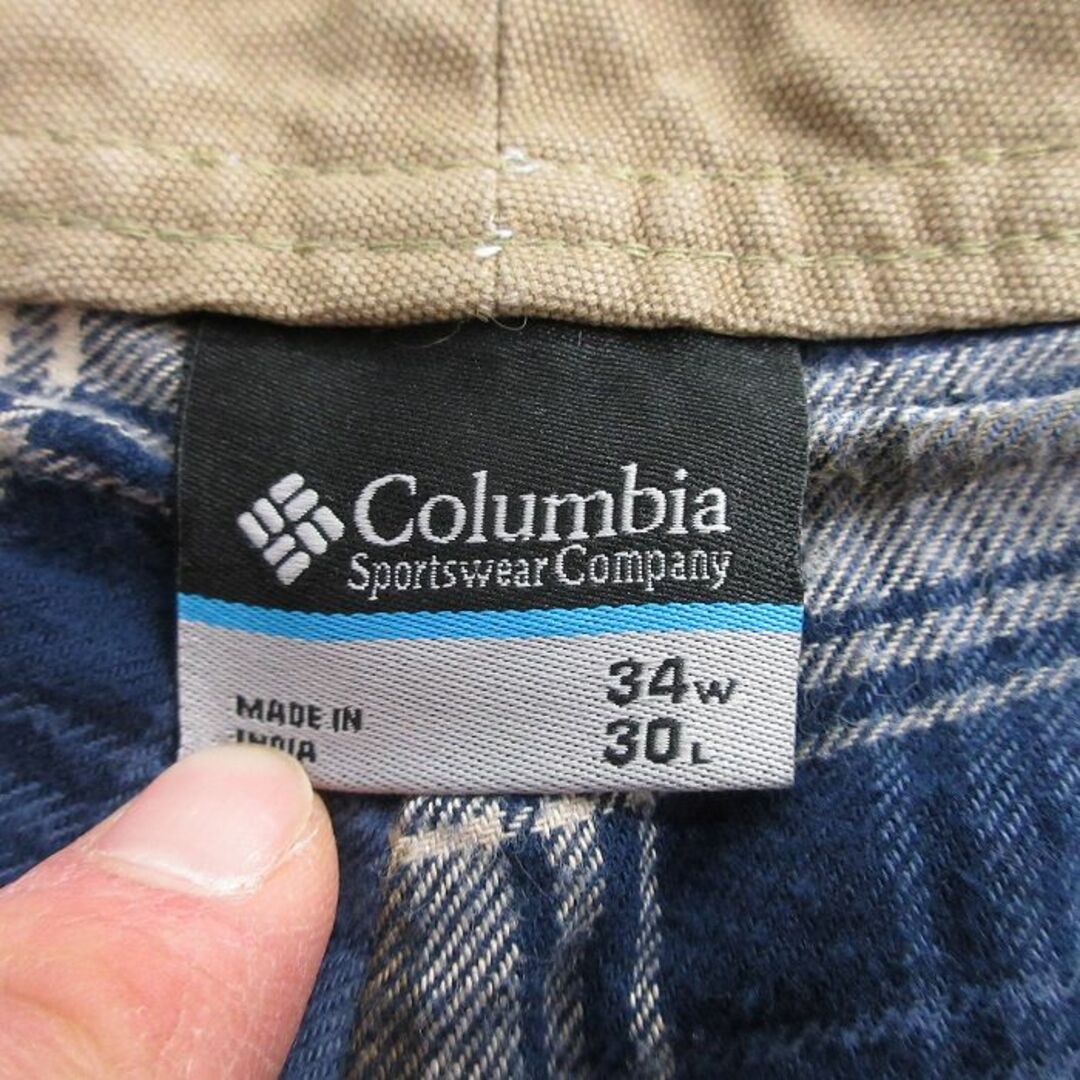 Columbia(コロンビア)のW34★古着 コロンビア COLUMBIA ハンティング パンツ メンズ PHG ダック地 コットン ベージュ カーキ 内側フランネル 24feb17 中古 ボトムス ロング メンズのパンツ(ワークパンツ/カーゴパンツ)の商品写真