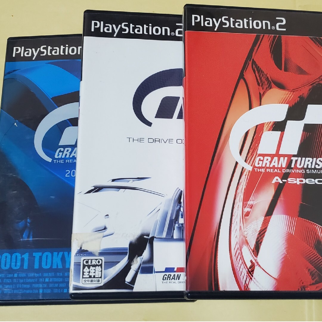 PlayStation2(プレイステーション2)のグランツーリスモセット　　PS2ソフト エンタメ/ホビーのゲームソフト/ゲーム機本体(家庭用ゲームソフト)の商品写真