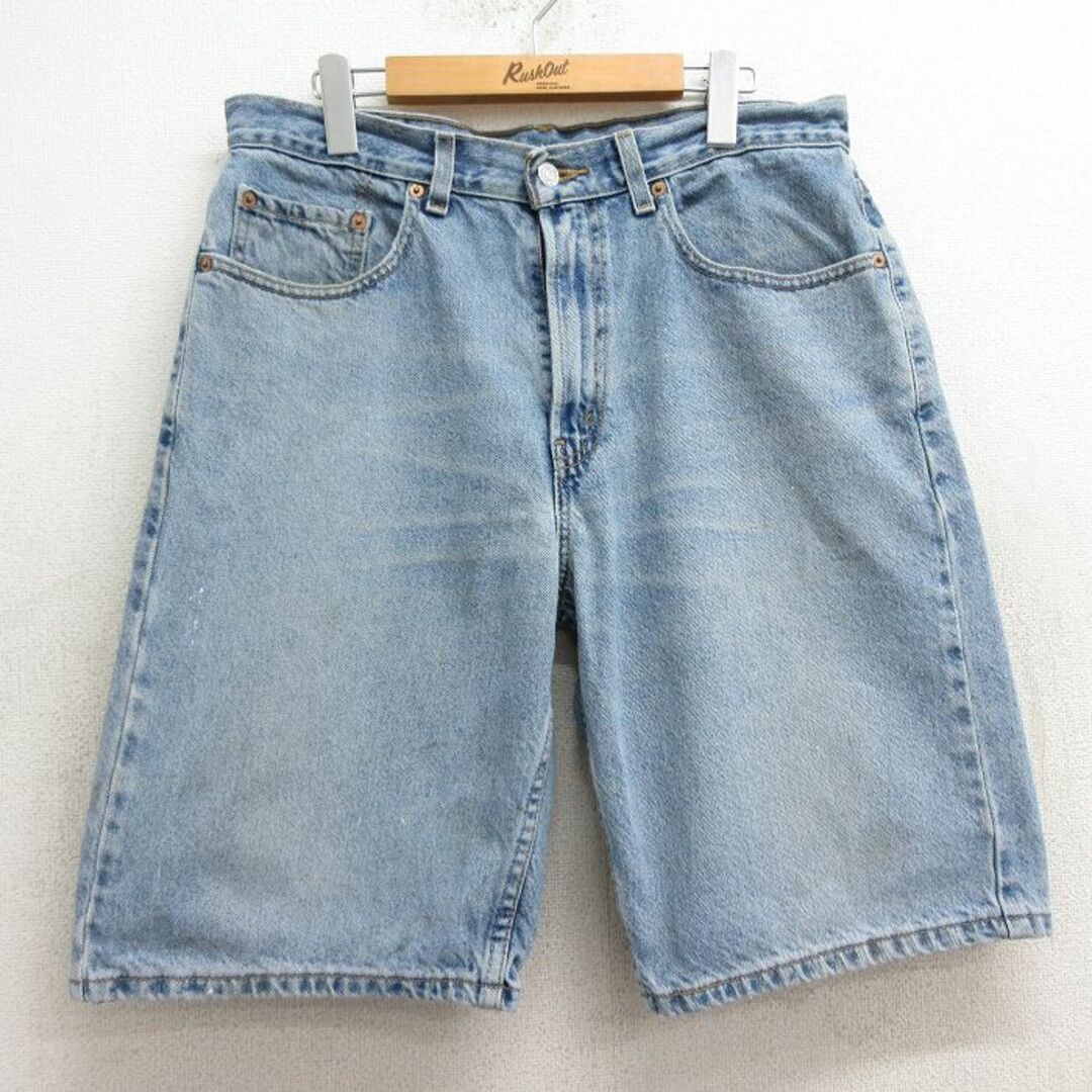 Levi's(リーバイス)のW33★古着 リーバイス Levis 569 ショート パンツ ショーツ メンズ ヒゲ コットン 紺 ネイビー デニム 24mar11 中古 ボトムス 短パン ショーパン ハーフ メンズのパンツ(ワークパンツ/カーゴパンツ)の商品写真