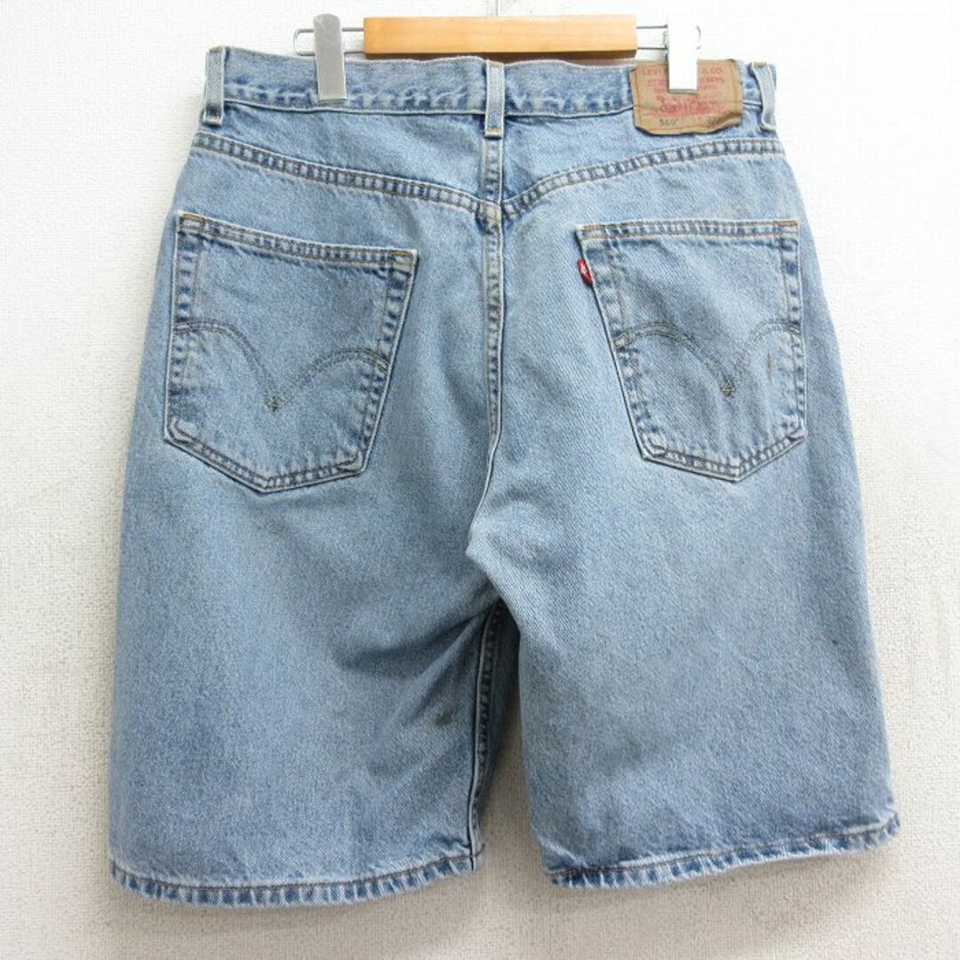 Levi's(リーバイス)のW33★古着 リーバイス Levis 569 ショート パンツ ショーツ メンズ ヒゲ コットン 紺 ネイビー デニム 24mar11 中古 ボトムス 短パン ショーパン ハーフ メンズのパンツ(ワークパンツ/カーゴパンツ)の商品写真