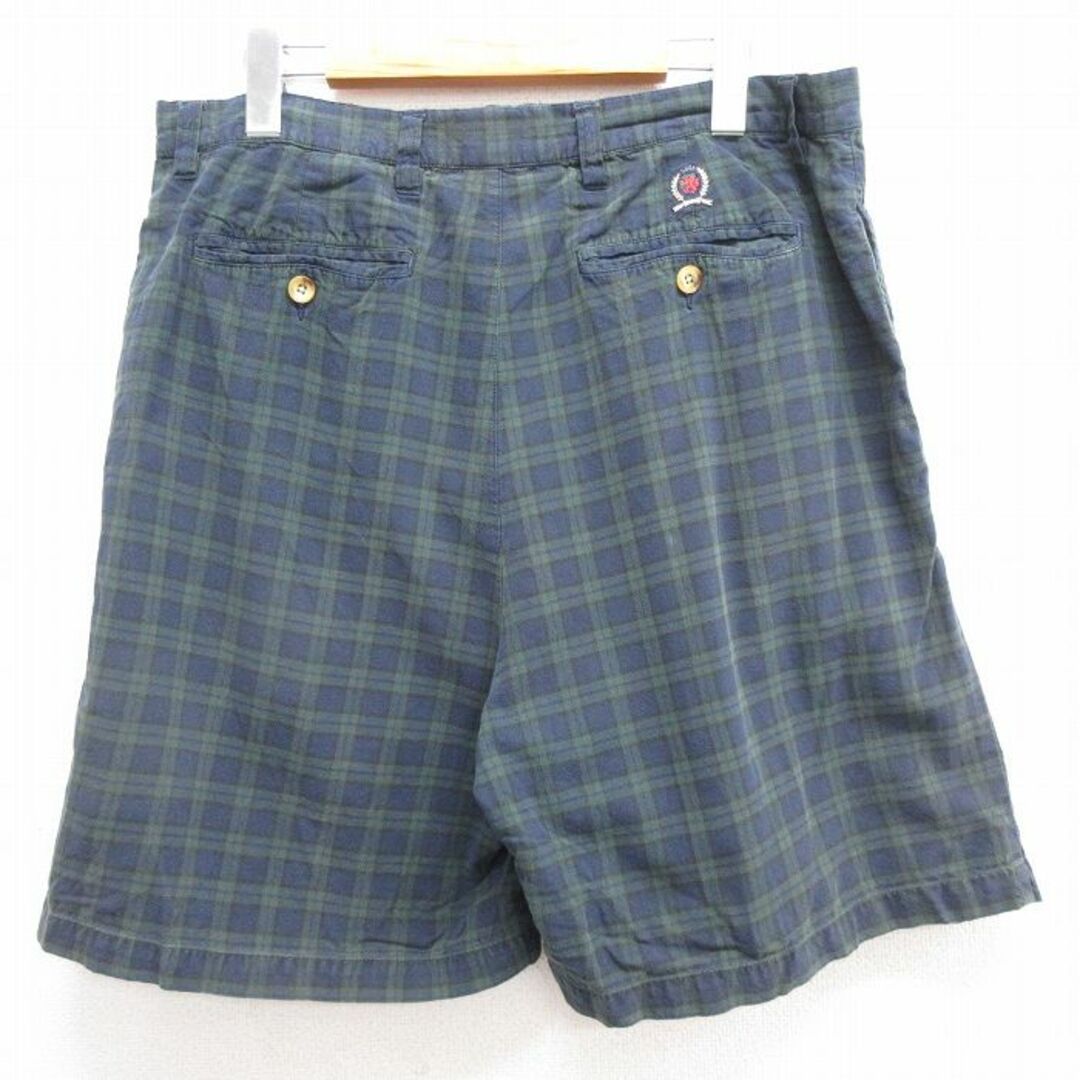 TOMMY HILFIGER(トミーヒルフィガー)のW36★古着 トミーヒルフィガー TOMMY HILFIGER ブランド ショート パンツ ショーツ メンズ 90年代 90s ワンポイントロゴ コットン 紺他 ネイビー タータン チェック 24mar14 中古 ボトムス 短パン ショーパン ハーフ メンズのパンツ(ワークパンツ/カーゴパンツ)の商品写真