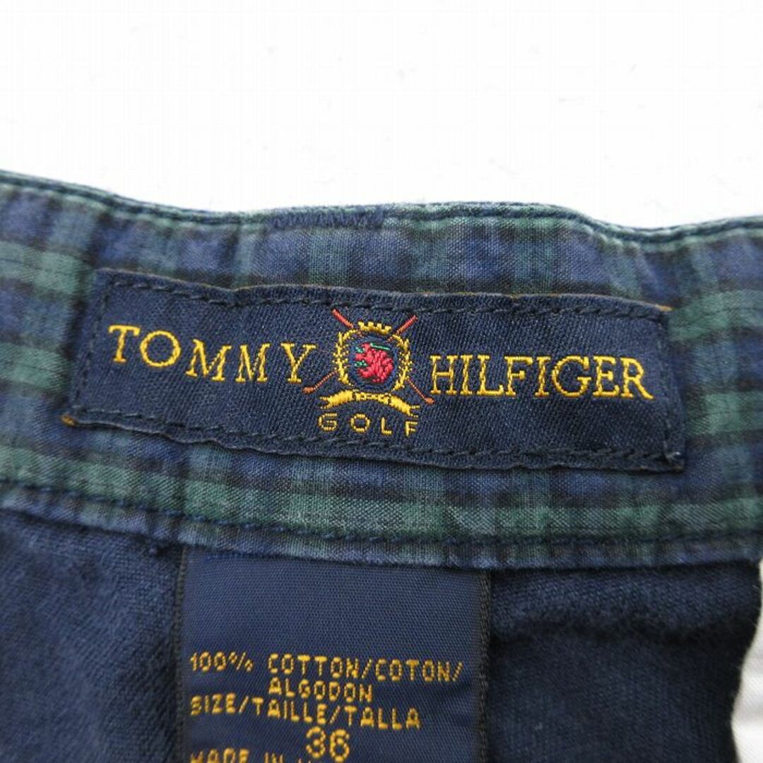 TOMMY HILFIGER(トミーヒルフィガー)のW36★古着 トミーヒルフィガー TOMMY HILFIGER ゴルフ ブランド ショート チノ パンツ チノパン ショーツ メンズ 90年代 90s ワンポイントロゴ コットン 紺 ネイビー 24mar14 中古 ボトムス 短パン ショーパン メンズのパンツ(ワークパンツ/カーゴパンツ)の商品写真