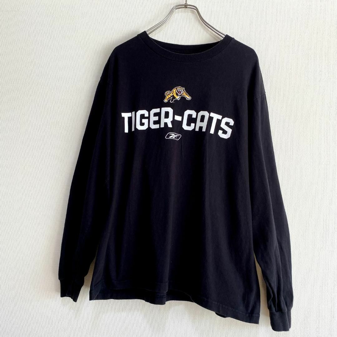 Reebok(リーボック)のアメリカ古着　CFL　ハミルトン・タイガーキャッツ　長袖　Tシャツ　ロンT メンズのトップス(Tシャツ/カットソー(七分/長袖))の商品写真