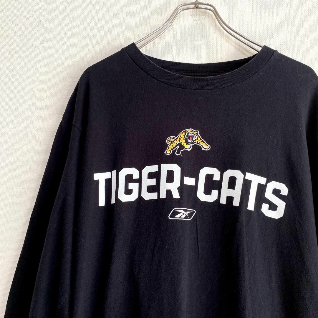 Reebok(リーボック)のアメリカ古着　CFL　ハミルトン・タイガーキャッツ　長袖　Tシャツ　ロンT メンズのトップス(Tシャツ/カットソー(七分/長袖))の商品写真