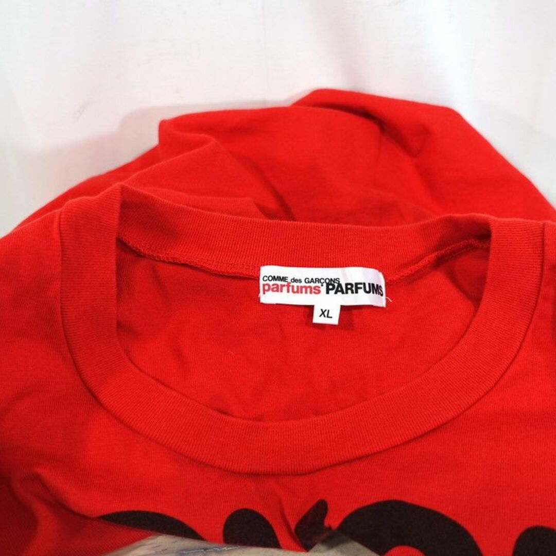 COMME des GARCONS(コムデギャルソン)の【良品】コムデギャルソン　パルファム　2019クリスマス限定　Ｔシャツ メンズのトップス(Tシャツ/カットソー(半袖/袖なし))の商品写真