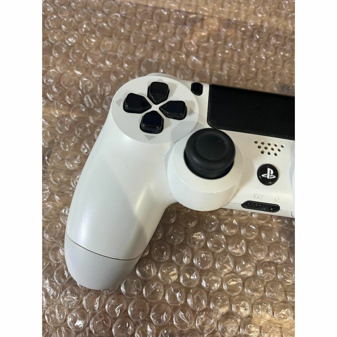 SONY(ソニー)の【ジャンク】コントローラー(DUALSHOCK 4)ホワイト CUH-ZCT1J エンタメ/ホビーのゲームソフト/ゲーム機本体(その他)の商品写真