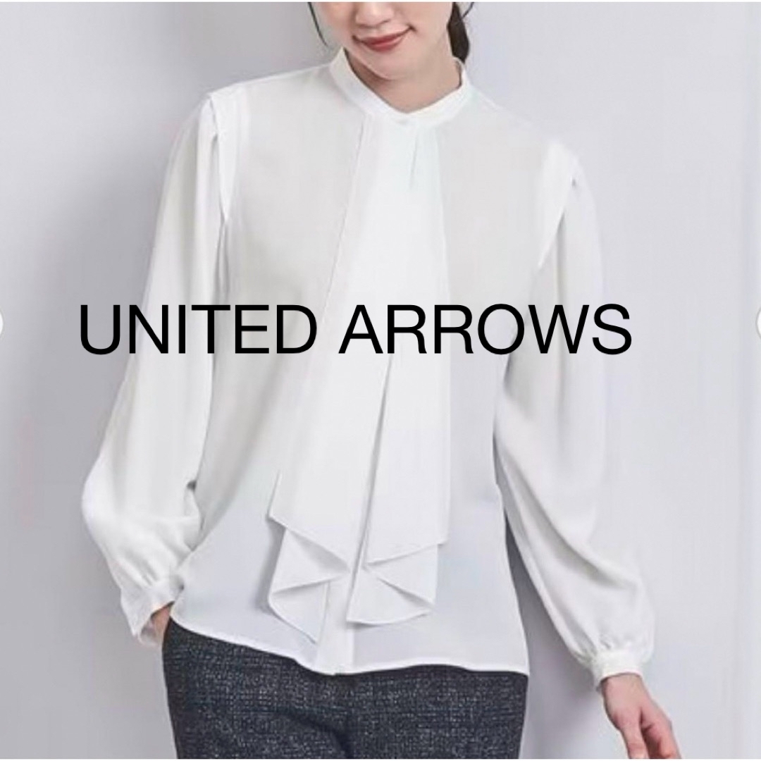 UNITED ARROWS(ユナイテッドアローズ)の【美品】ユナイテッドアローズ　フロントフリル　ブラウス　白 レディースのトップス(シャツ/ブラウス(長袖/七分))の商品写真