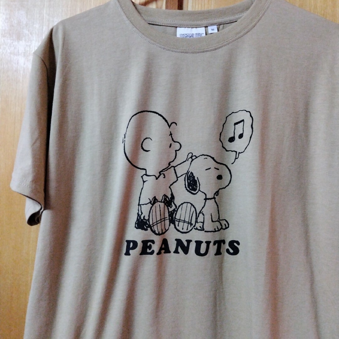 SNOOPY(スヌーピー)の【新品　未使用】スヌーピー　Tシャッ　チュニック　半袖　ベージュ　M レディースのトップス(Tシャツ(半袖/袖なし))の商品写真