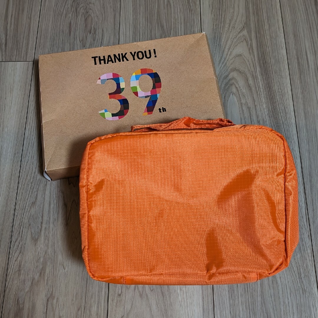 UNIQLO(ユニクロ)の新品 UNIQLO ユニクロ 39周年 ノベルティ 大容量 ポーチ オレンジ レディースのファッション小物(ポーチ)の商品写真