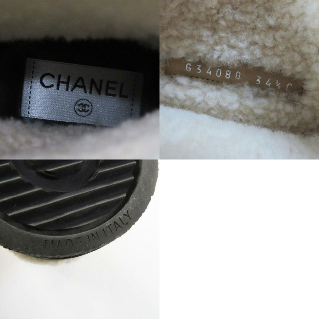 CHANEL(シャネル)の極美品◎CHANEL シャネル G34080 ロゴ入り レザー使い ムートンブーツ/ショートブーツ ブラック ベージュ 34.5 保存袋付き イタリア製 レディース レディースの靴/シューズ(ブーツ)の商品写真