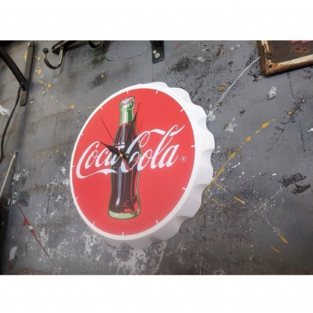 コカ・コーラ(コカコーラ)のコカ・コーラ オフィシャルグッズ  知ると凄い 掛け時計   Coca-Cola インテリア/住まい/日用品のインテリア小物(掛時計/柱時計)の商品写真
