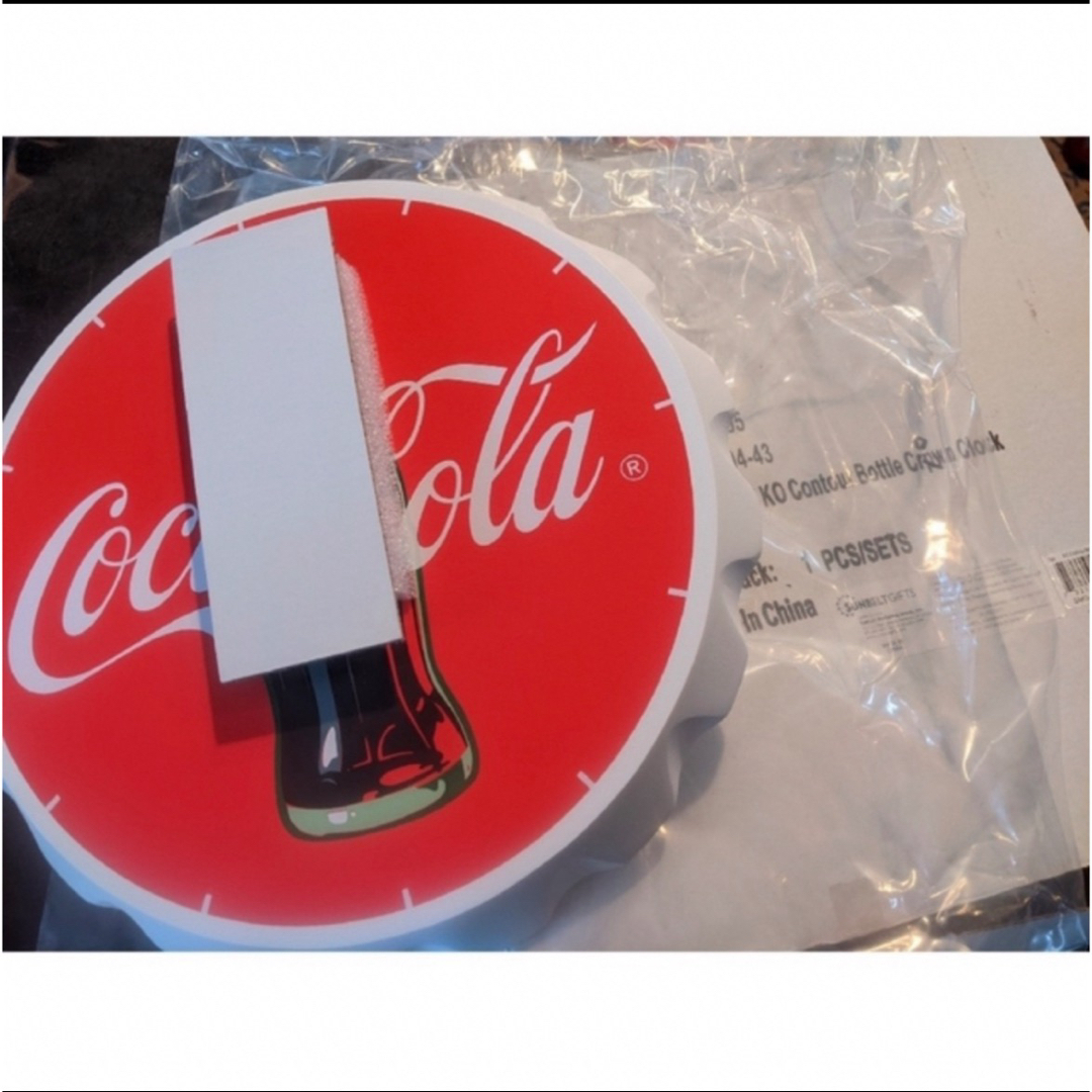 コカ・コーラ(コカコーラ)のコカ・コーラ オフィシャルグッズ  知ると凄い 掛け時計   Coca-Cola インテリア/住まい/日用品のインテリア小物(掛時計/柱時計)の商品写真