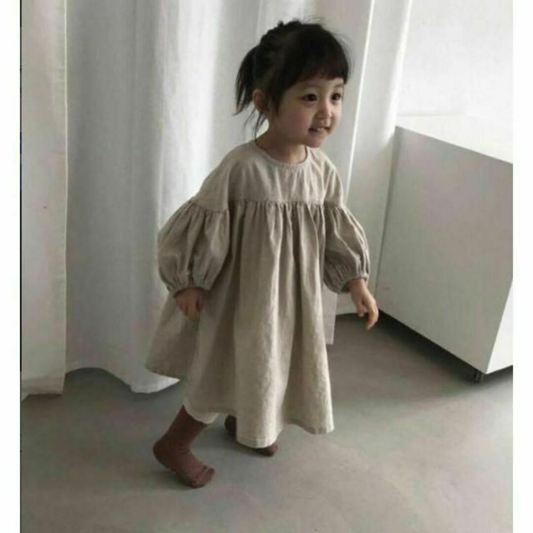 バルーン袖ワンピース　ベージュ130cm 韓国子供服　ぽわん袖 キッズ/ベビー/マタニティのキッズ服女の子用(90cm~)(ワンピース)の商品写真