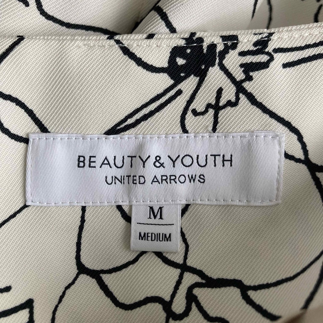 BEAUTY&YOUTH UNITED ARROWS(ビューティアンドユースユナイテッドアローズ)のユナイテッドアローズ　BY モノトーンプリントラップスカート　ホワイト　花柄　M レディースのスカート(ロングスカート)の商品写真