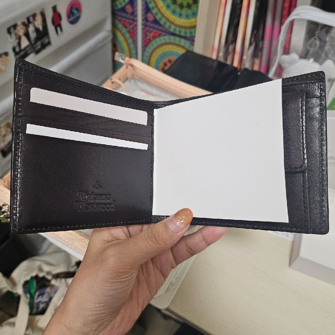 Vivienne Westwood(ヴィヴィアンウエストウッド)の最終お値下げ！ヴィヴィアンウエストウッド 　コッパー　二つ折り財布 ブラック メンズのファッション小物(折り財布)の商品写真