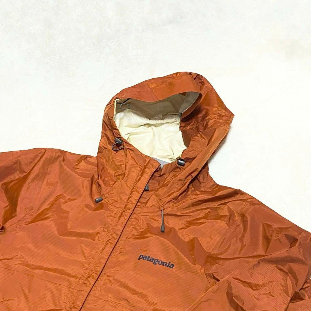 patagonia(パタゴニア)のパタゴニア　マウンテンパーカー　オレンジ　サイズXS メンズのジャケット/アウター(マウンテンパーカー)の商品写真