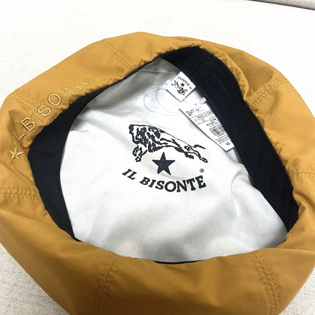 IL BISONTE(イルビゾンテ)のイルビゾンテ ベレー帽 帽子 麻 コットン レザーパッチ付き ユニセックス　黄色 メンズの帽子(ハンチング/ベレー帽)の商品写真