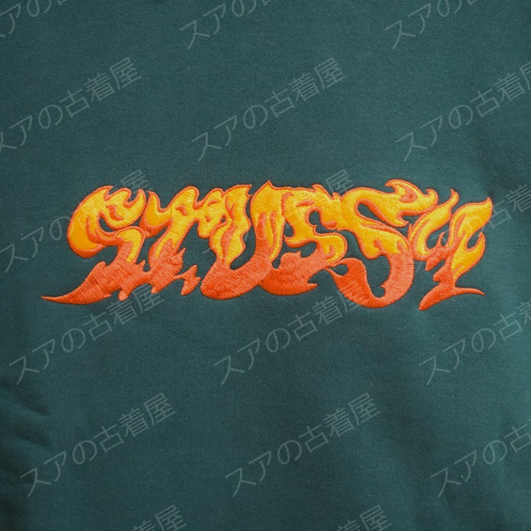 STUSSY(ステューシー)の《ステューシー》正規・未使用品　ファイヤー刺繡ロゴ　グリーン　L　パーカー メンズのトップス(パーカー)の商品写真