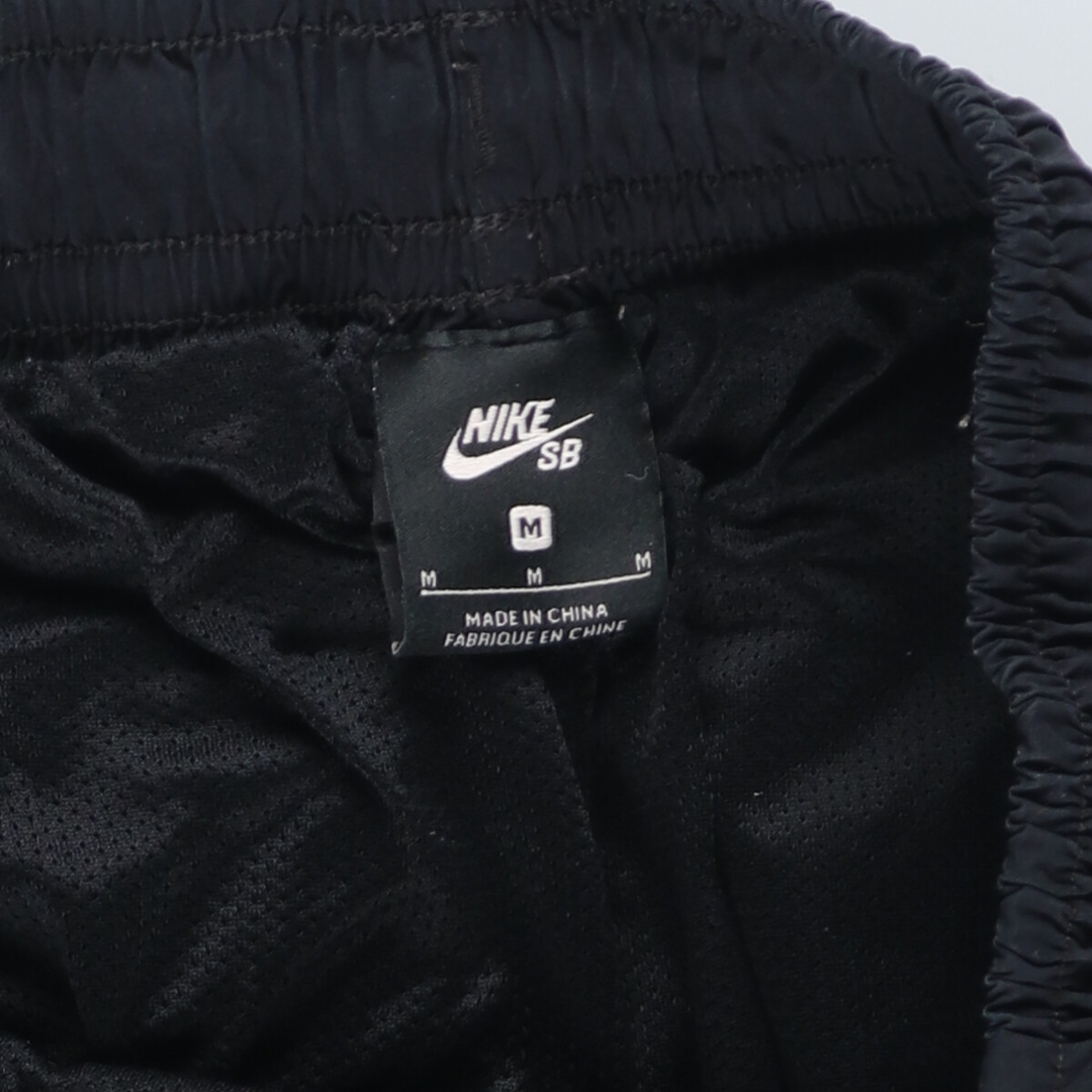 NIKE(ナイキ)の古着 ナイキ NIKE ナイロンパンツ シャカシャカパンツ メンズM /eaa428304 メンズのパンツ(その他)の商品写真