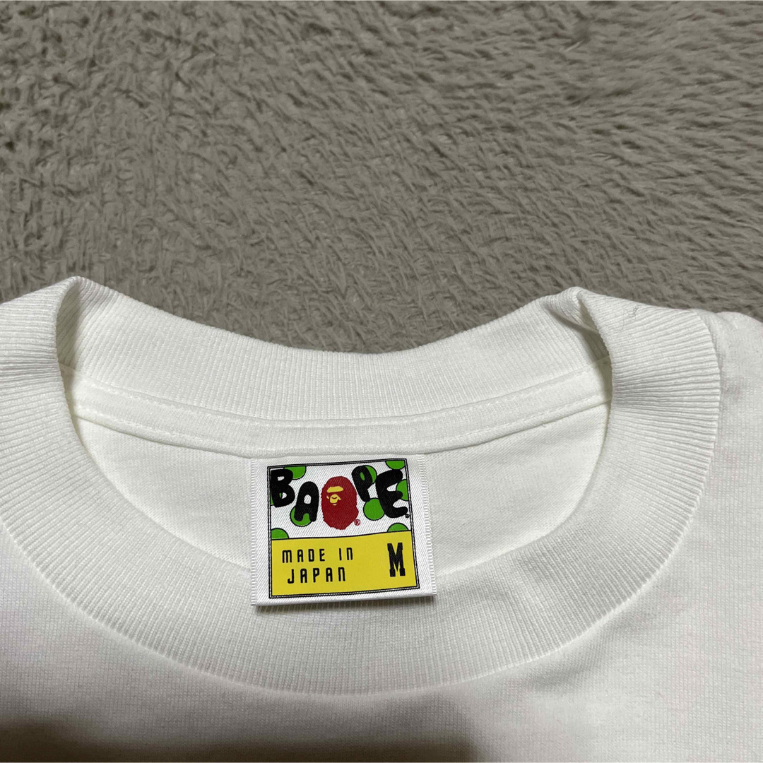 A BATHING APE(アベイシングエイプ)のAPE BAPE KAWS スワロフスキー　tee tシャツ　ラインストーン　M メンズのトップス(Tシャツ/カットソー(半袖/袖なし))の商品写真