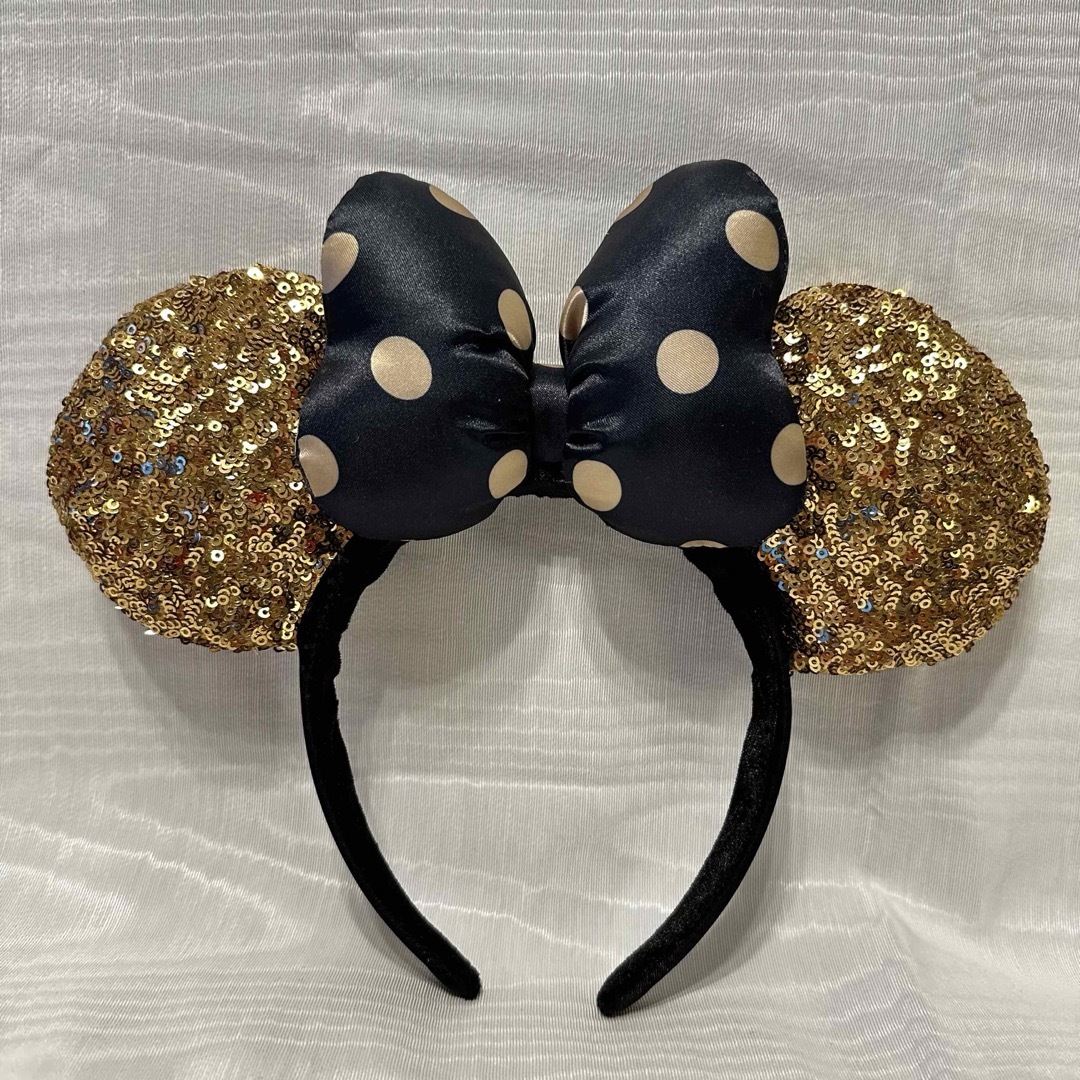 Disney(ディズニー)のディズニー　ミニーカチューシャ　スパンコール　ゴールド　ブラック　美品 レディースのヘアアクセサリー(カチューシャ)の商品写真