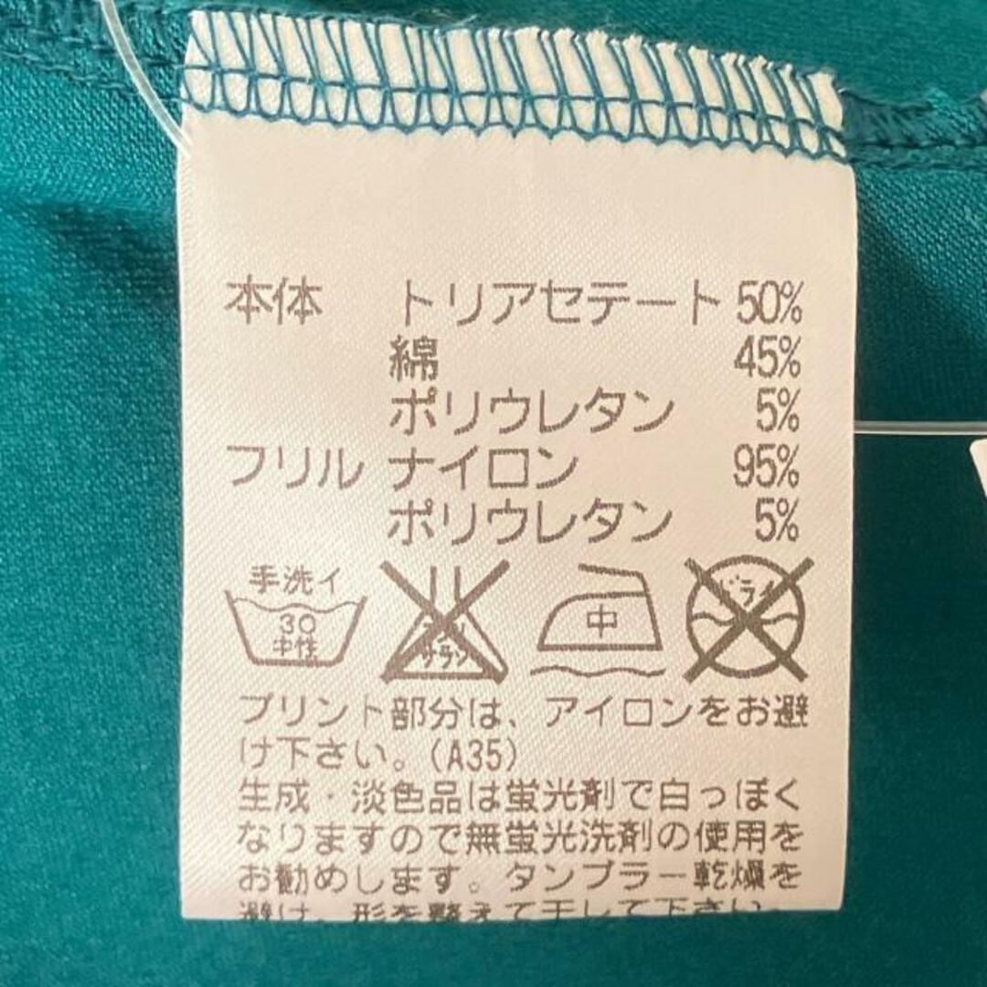 TOKUKO 1er VOL(トクコプルミエヴォル)のTOKUKO 1er VOL(トクコ・プルミエヴォル) ワンピース サイズ9 M レディース - グリーン ハイネック/長袖/ひざ丈/フリル レディースのワンピース(その他)の商品写真