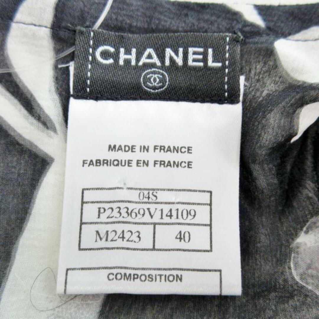 CHANEL(シャネル)のCHANEL(シャネル) ノースリーブカットソー サイズ40 M レディース美品  - P23369 黒×白 花柄/シースルー/リボン シルク レディースのトップス(カットソー(半袖/袖なし))の商品写真