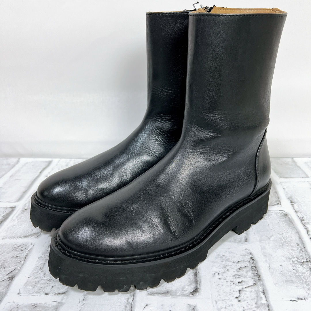 CAMINANDO(カミナンド)の《美品》カミナンド ショートブーツ 厚底 サイドジップ 革 レザー 黒 W8 レディースの靴/シューズ(ブーツ)の商品写真
