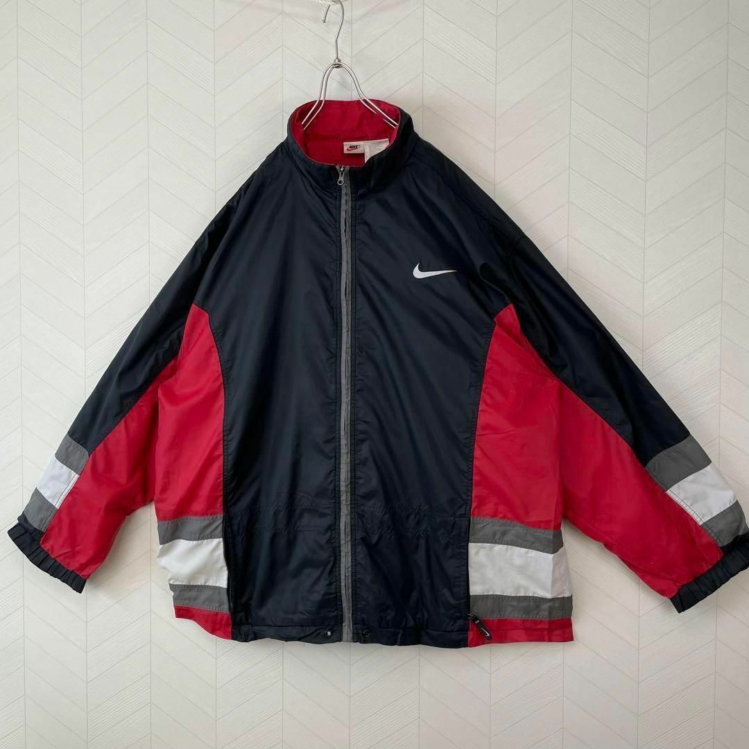 NIKE(ナイキ)の入手困難 90s ナイキ ナイロン トラックジャケット デカロゴ オーバーサイズ メンズのジャケット/アウター(ナイロンジャケット)の商品写真