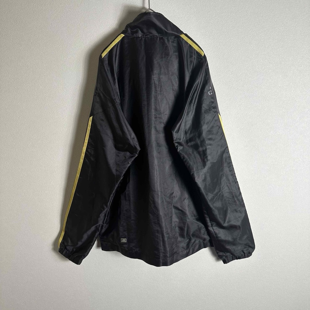 adidas(アディダス)のアディダス　Mサイズ　ナイロンジャケット上下セットアップ　刺繍ロゴ　ブラック　黒 メンズのジャケット/アウター(ナイロンジャケット)の商品写真