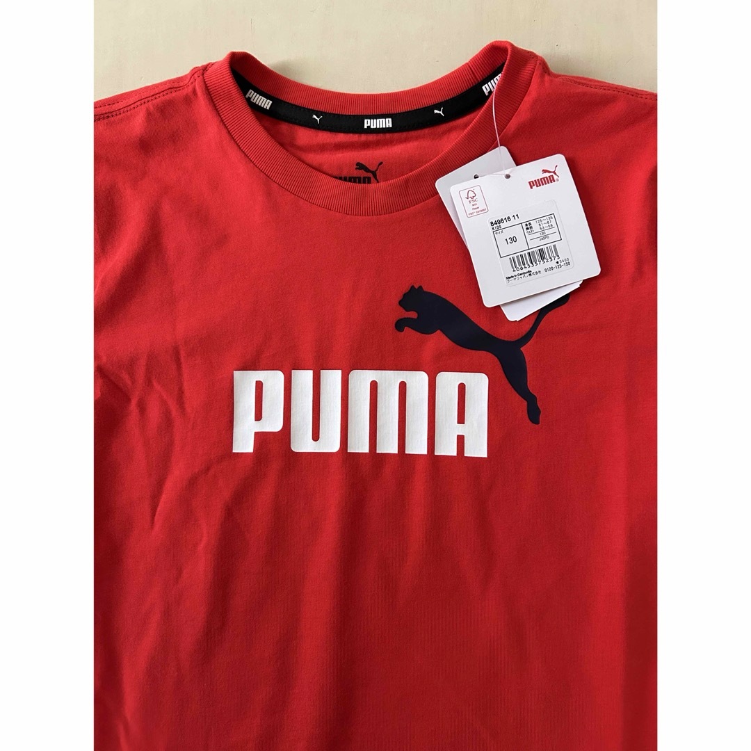 PUMA(プーマ)の新品タグ付き　130㎝ PUMAプーマ上下セットアップ　レッド×ネイビー キッズ/ベビー/マタニティのキッズ服男の子用(90cm~)(Tシャツ/カットソー)の商品写真