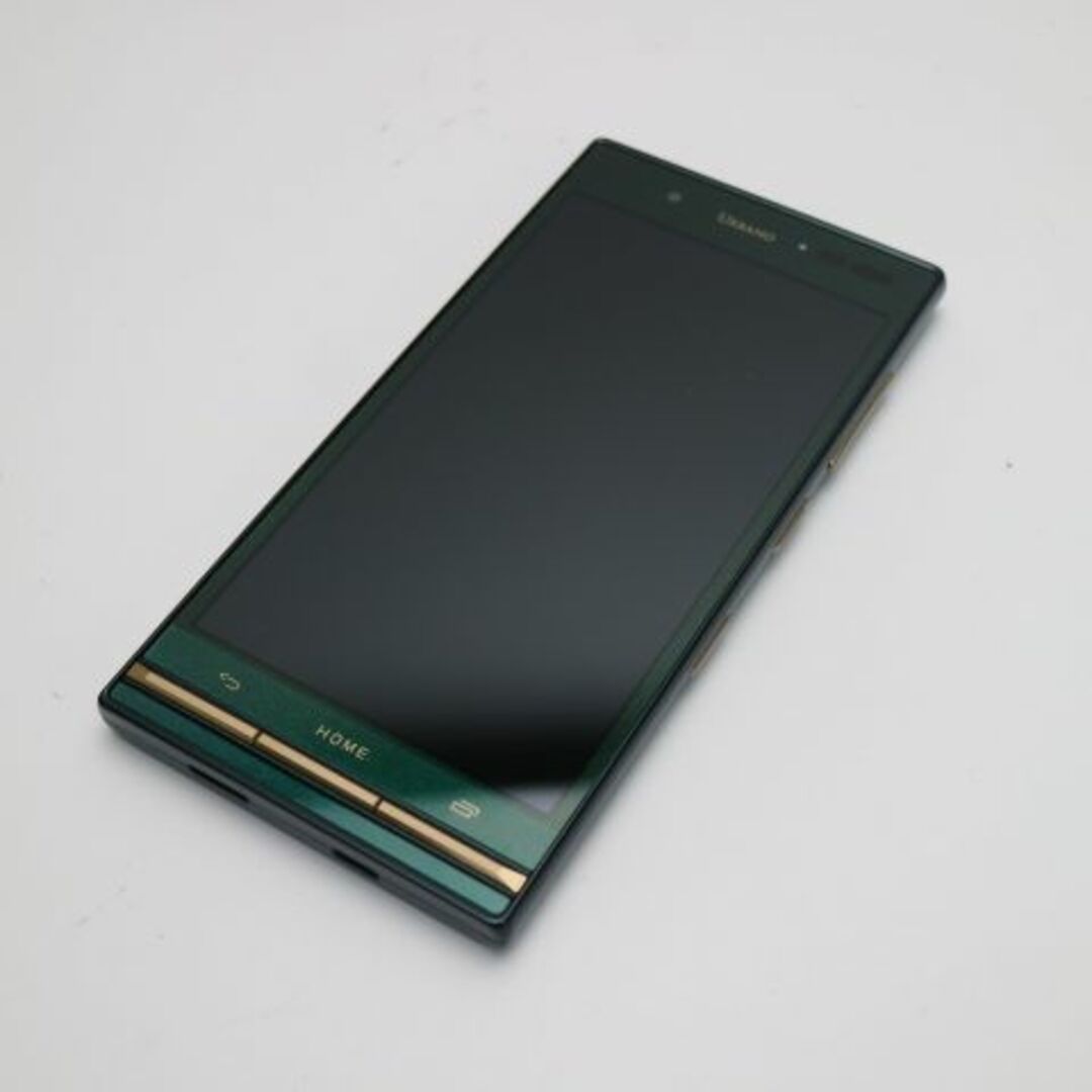 京セラ(キョウセラ)の新品同様 au KYV38 URBANO V03 ブリティッシュグリーン  M777 スマホ/家電/カメラのスマートフォン/携帯電話(スマートフォン本体)の商品写真