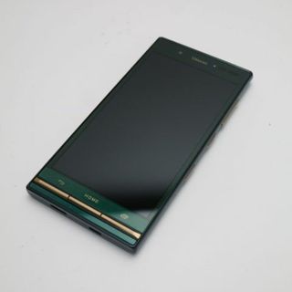 キョウセラ(京セラ)の新品同様 au KYV38 URBANO V03 ブリティッシュグリーン  M777(スマートフォン本体)