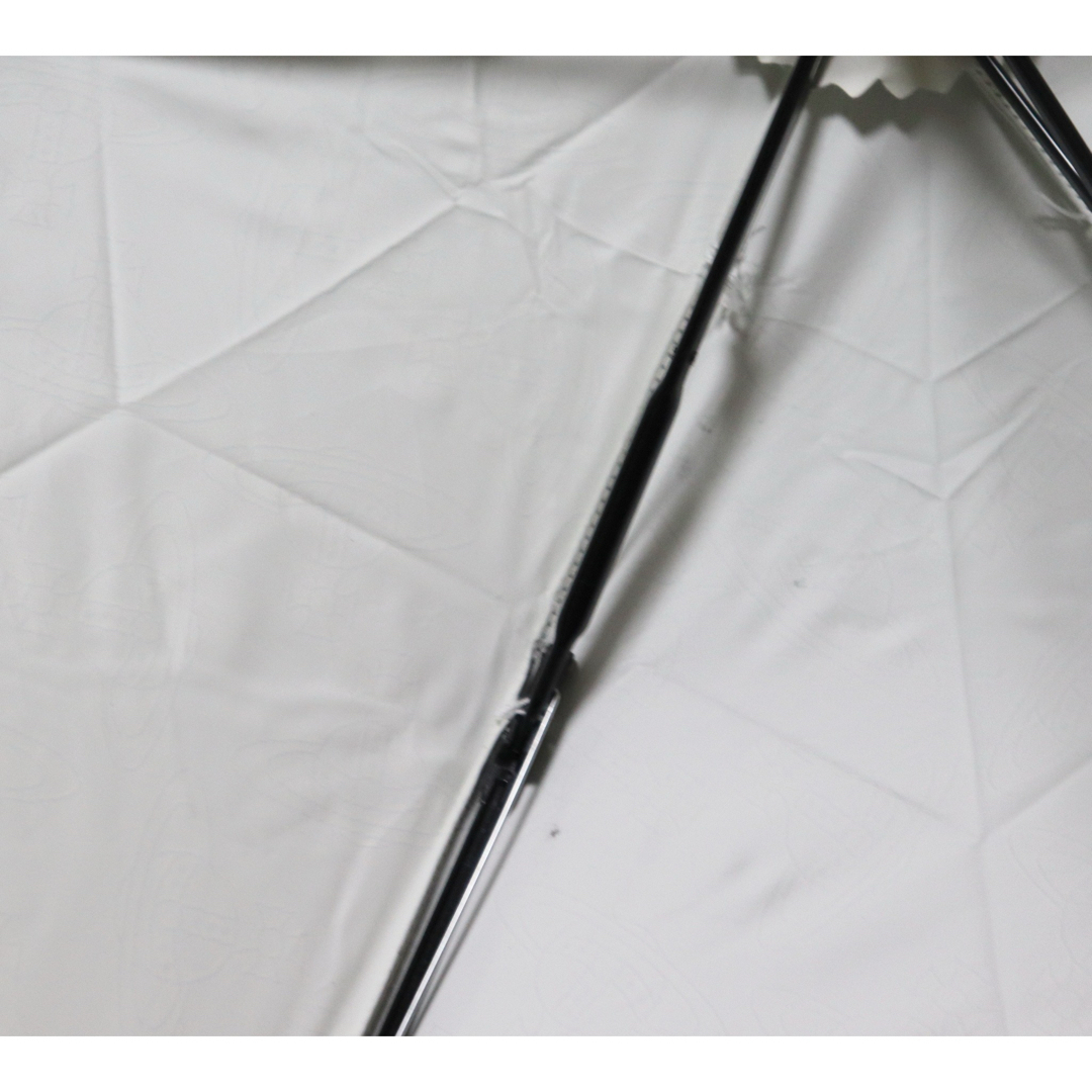 Vivienne Westwood(ヴィヴィアンウエストウッド)の《ヴィヴィアンウエストウッド》新品訳有 オーブ総柄 晴雨兼用折りたたみ傘 日傘 レディースのファッション小物(傘)の商品写真