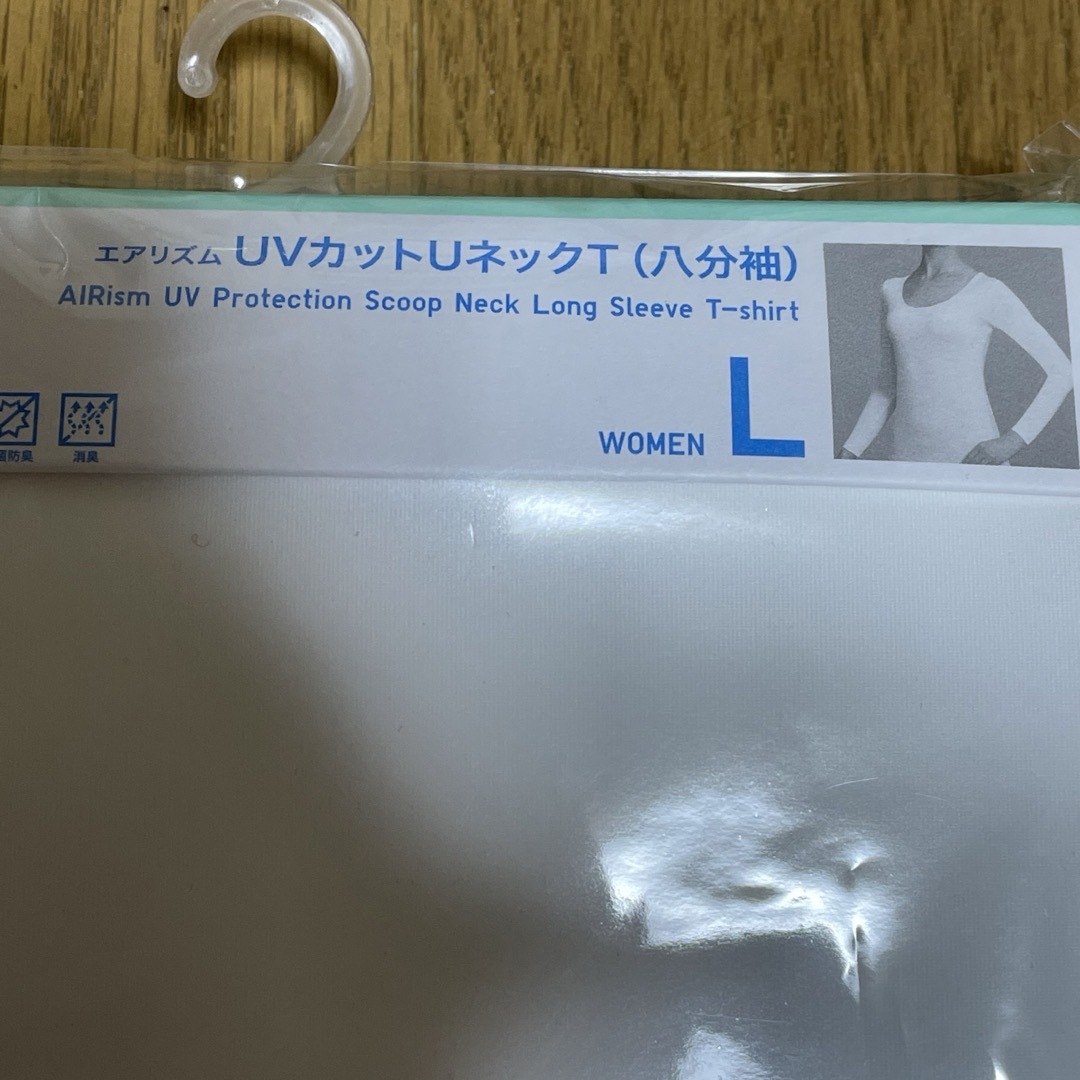 UNIQLO(ユニクロ)のユニクロ エアリズム UVカットUネックT 八分袖 L 白 レディースの下着/アンダーウェア(アンダーシャツ/防寒インナー)の商品写真