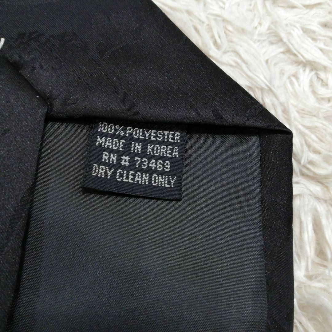 ルーニーテューンズ　ネクタイ　タスマニアデビル　ダフィーダック　ブラック 黒 メンズのファッション小物(ネクタイ)の商品写真