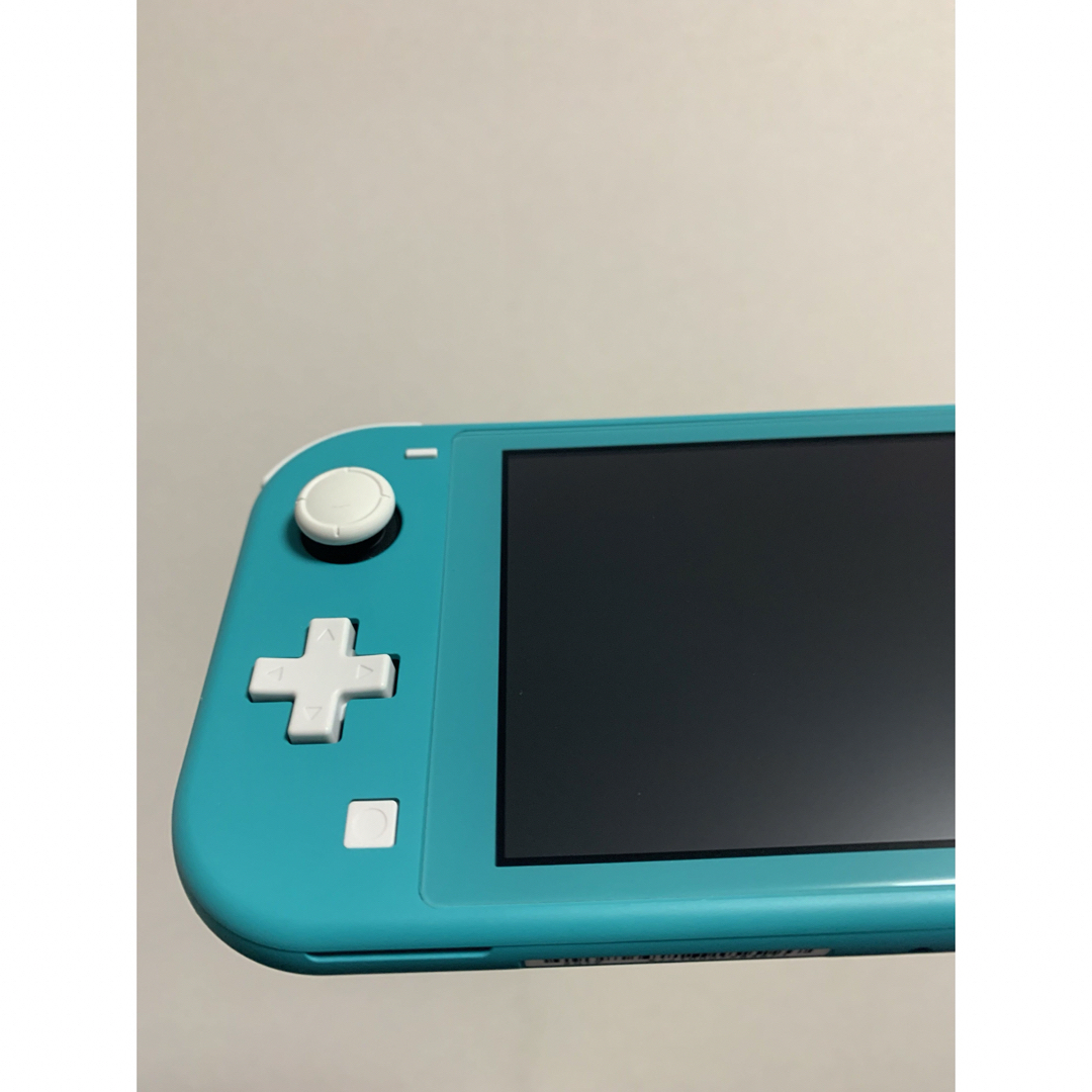 Nintendo Switch(ニンテンドースイッチ)の【美品】Switchライト本体 ターコイズ おまけ2点付き♪ エンタメ/ホビーのゲームソフト/ゲーム機本体(携帯用ゲーム機本体)の商品写真