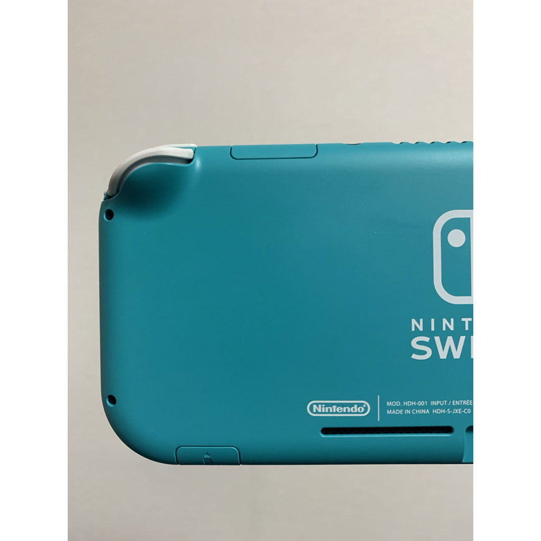 Nintendo Switch(ニンテンドースイッチ)の【美品】Switchライト本体 ターコイズ おまけ2点付き♪ エンタメ/ホビーのゲームソフト/ゲーム機本体(携帯用ゲーム機本体)の商品写真